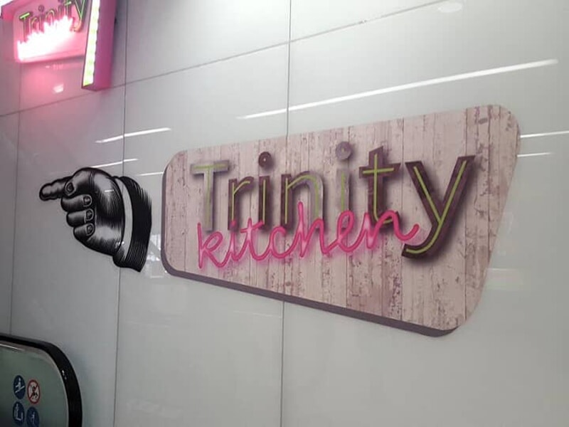 An image of the Trinity Kitchen directional signage.